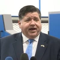 Gov. JB Pritzker tells reporters he is “all in” for President Joe Biden at an unrelated news conference in Chicago on Tuesday. (Credit: Illinois.gov)
