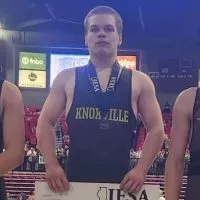 Knoxville Jr. High School's James Long^ center^ won the 185 Class A championship at the Illinois Elementary School Association State Wrestling Tournament on Saturday at the NIU Convocation Center in DeKalb.