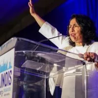 Lisa Hernandez^ a state representative and chair of the Democratic Party of Illinois^ speaks to members of her party at a Democratic National Convention delegation breakfast. (Capitol News Illinois photo by Andrew Adams)