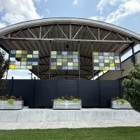 Three stained panels—featuring shades of yellow^ gray^ and black—were recently installed on the west-facing side of Reserve Artisan Ales^ 185 S. Kellogg St. (JAY REDFERN/WGIL)