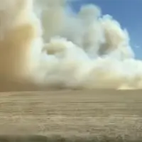 Area fire crews battled a large field fire near Rio on Sunday^ as dangerously dry and windy conditions fueled the blaze.