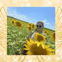 Abigail Small in a sunflower field