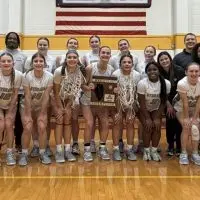 Galesburg Silver Streaks girls basketball team with regional championship trophy
