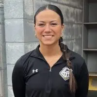 Galesburg High School softball coach Andrea Sampson in the dugout