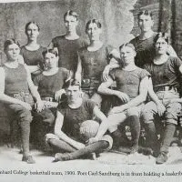 The 1900 Lombard College basketball team^ with Carl Sandburg seated in front holding a basketball