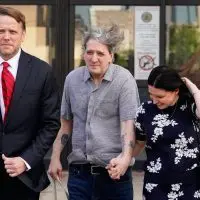 Richard Glossip walks out of Oklahoma jail with wife Lea Glossip and attorney Donald Knight on May 15^ 2026