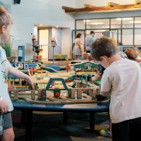 Children playing at the train table inside Discovery Depot Children's Museum in Galesburg^ Illinois