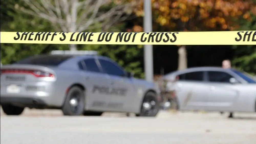 Crime scene tape blocks the entrance to Smile Creators Family and Cosmetic Dentistry on Jonesboro Road. McDonough^ Georgia- December 6^ 2018