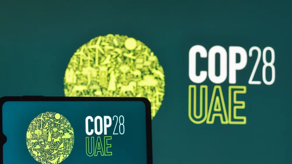 Image of the 2023 COP28 UAE conference in Expo City Dubai logo. COP28