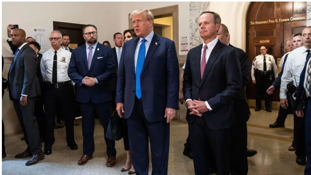 Former President Donald Trump speaks to press before the start of civil fraud trial brought by NYS Attorney General Letitia James at NYS court in New York on October 2^ 2023