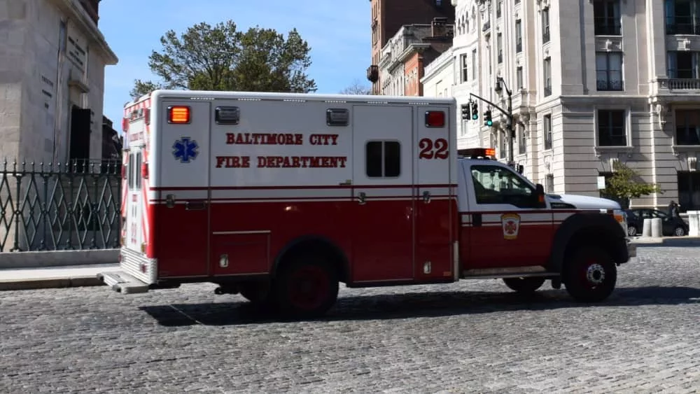 Baltimore City Fire Department ambulance driving through Mount Vernon