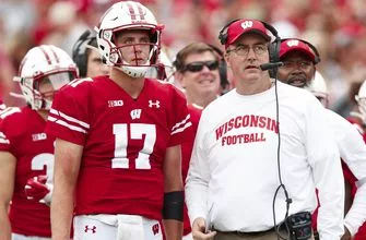 jack-coan-paul-chryst-wisconsin-vresize-335-220-high_-0