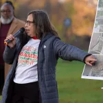 Irene Ponce addresses the crowd at a plaque dedication ceremony marking the location of four Railroad Camps on Monday, Oct. 30, 2023, in Galesburg. (BILL GAITHER/CARL SANDBURG COLLEGE)