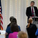 The Galesburg Chamber of Commerce hosted its 45th Annual Thanksgiving Luncheon on Monday, Nov. 20, 2023, at Cedar Creek Hall. Galesburg Mayor Peter Schwartzman gives his state of the city address. (Photo by Bill Gaither)