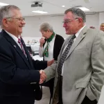 The Galesburg Chamber of Commerce hosted its 45th Annual Thanksgiving Luncheon on Monday, Nov. 20, 2023, at Cedar Creek Hall. From left are Don Moffitt and John Schlaf. (Photo by Bill Gaither)