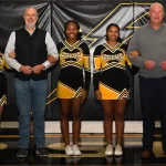 Former longtime Register-Mail sports editor Mike Trueblood was inducted into the Galesburg Athletic Hall of Fame on Saturday, Nov. 25, 2023, in Galesburg High School. He is represented by his sons, from left: Kevin Trueblood and Ted Trueblood. (Courtesy Dickerson Photography)