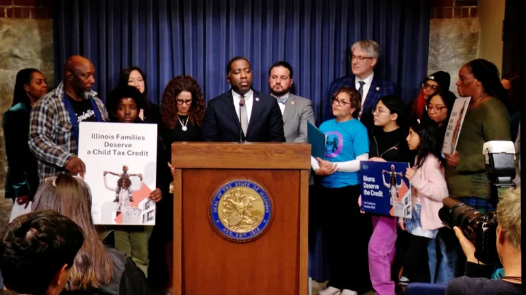 State Rep. Marcus Evans, D-Chicago, is joined by a coalition of advocates at a Statehouse news conference to push for a $300 per-child tax credit.