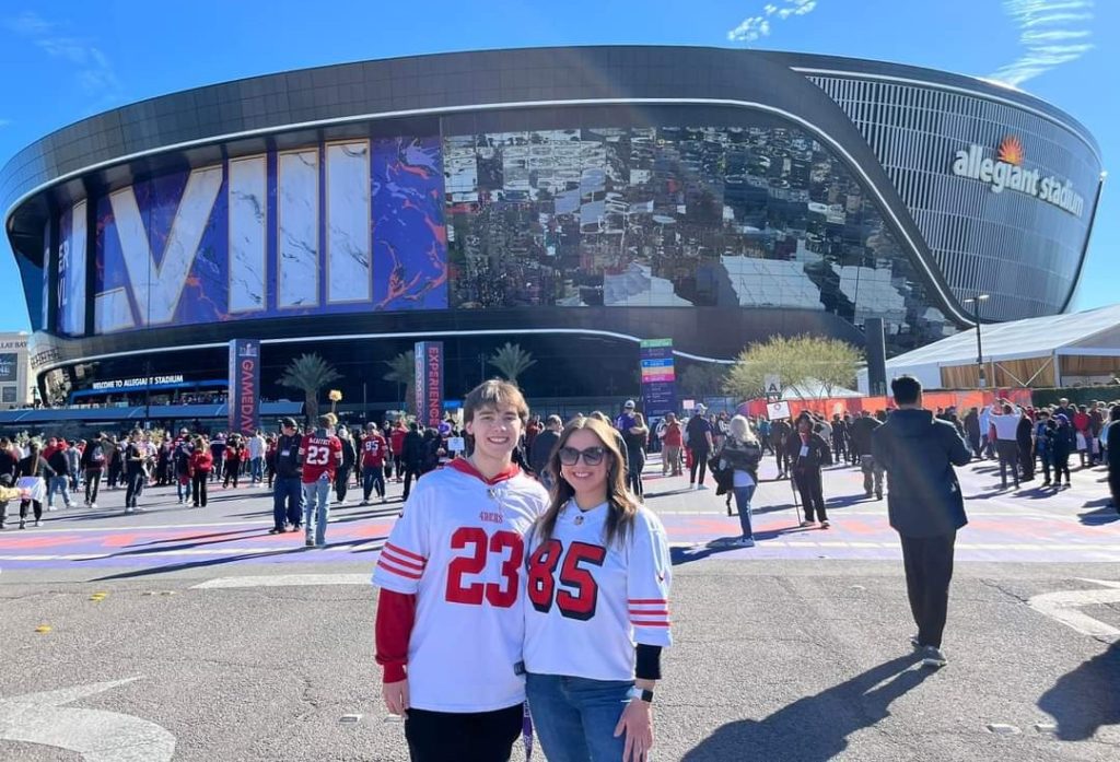 Clark Bernett and Montana Bernett in front of Allegiant Stadium in Las Vegas