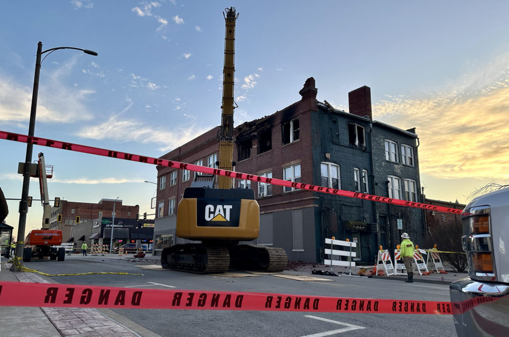 Demolition started Tuesday evening, Feb. 20, 2024, on downtown Galesburg building at 149-151 E. Main St. that suffered extensive structural damage from a Monday fire. 