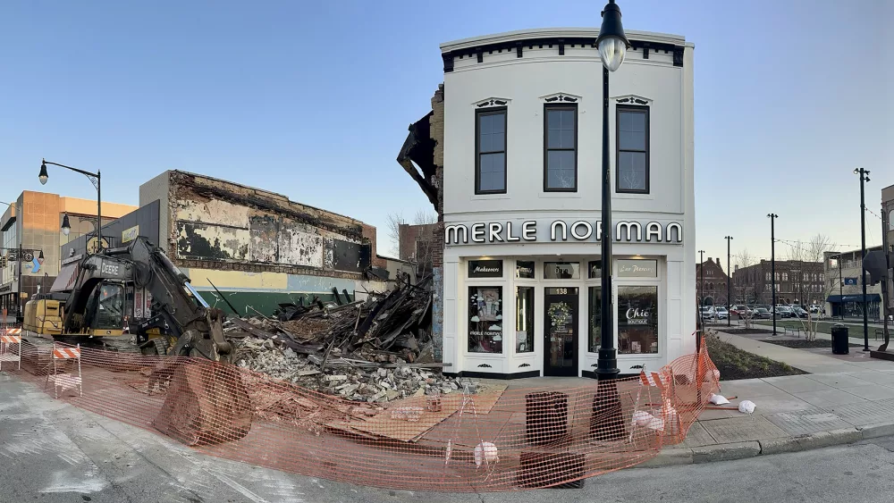 Demolition of the fire-damaged buildings 140-144 E. Main St. got underway Monday, March 18, 2024.