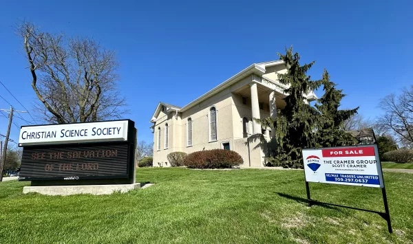 For sale signs are planted along the perimeter of the Galesburg Christian Society church, 600 N. Broad St.