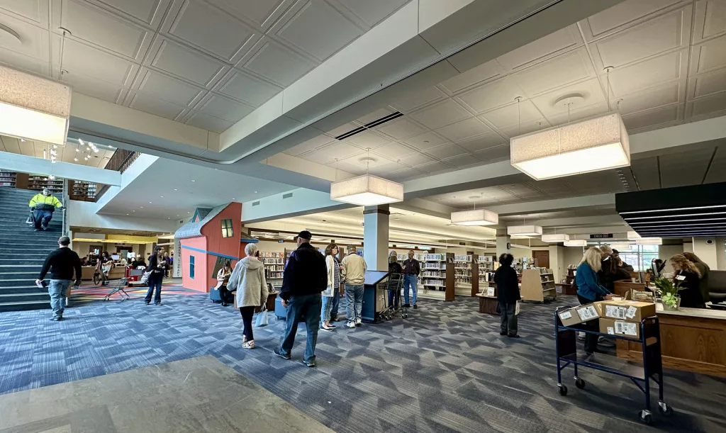 Patrons move about the new Galesburg Public Library, 264 W. Main St., on Wednesday, April 24, 2024.