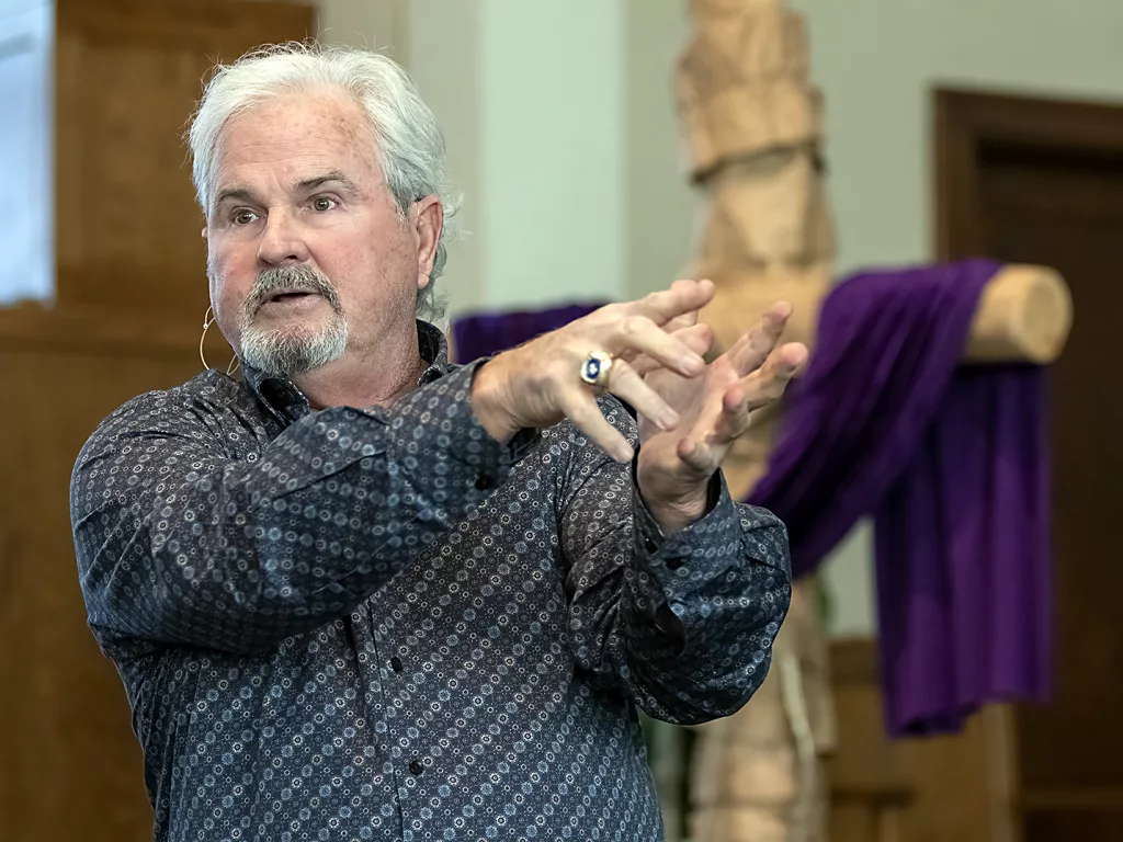 Three-time Major League Baseball all-star and Galesburg native Jim Sundberg gestures as he gives the message at First Christian Church, 301 N. Broad St., on Sunday, March 13, 2022.