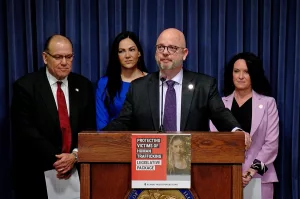 Republican representatives are pictured at a March news conference Springfield, which they called to promote bills aimed at protecting human trafficking victims. Pictured at the podium is Rep. Jeff Keicher, R-Sycamore. Other lawmakers from left to right are Rep. Brad Stephens, R-Rosemont; Rep. Nicole La Ha, R-Homer Glen; and Rep. Jennifer Sanalitro, R-Hanover Park. (Capitol News Illinois photo by Andrew Campbell)