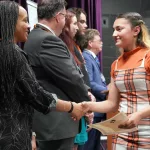 Gale_Scholars_Induction13: Ten members of the George Washington Gale Scholars Class of 2028 were inducted Tuesday, May 8, during a ceremony held in the Galesburg High School Little Theater. Inductees included: SaraRose Carrillo Fredrickson, William Grant IV, Ana Gutierrez, Harley Harris, Aaron Johnson Baker, Alondra Morales, Miles Patrick, Jasper Petry-Garcia, Tymyra Siby and Zacheriah Smith.
Attendees heard remarks from speakers including Steve Cheesman, director of George Washington Gale Scholars Program; Dr. Seamus Reailly, president of Carl Sandburg College; Randi Torrance, director of TRIO Upward Bound Math-Science at Sandburg and a Gale Scholar alumna; and Tyler Ferris, senior computer science major at Knox College.
