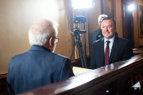 Deputy Gov. Andy Manar talks to host Jak Tichenor on the set of “Illinois Lawmakers,” Illinois’ longest-running state government-focused TV program that is now a production of Capitol News Illinois. Manar told Tichenor none of the governor’s revenue proposals – or any brought forth by the General Assembly – are off the table with a week remaining in the legislative session. (Capitol News Illinois photo by Jerry Nowicki)