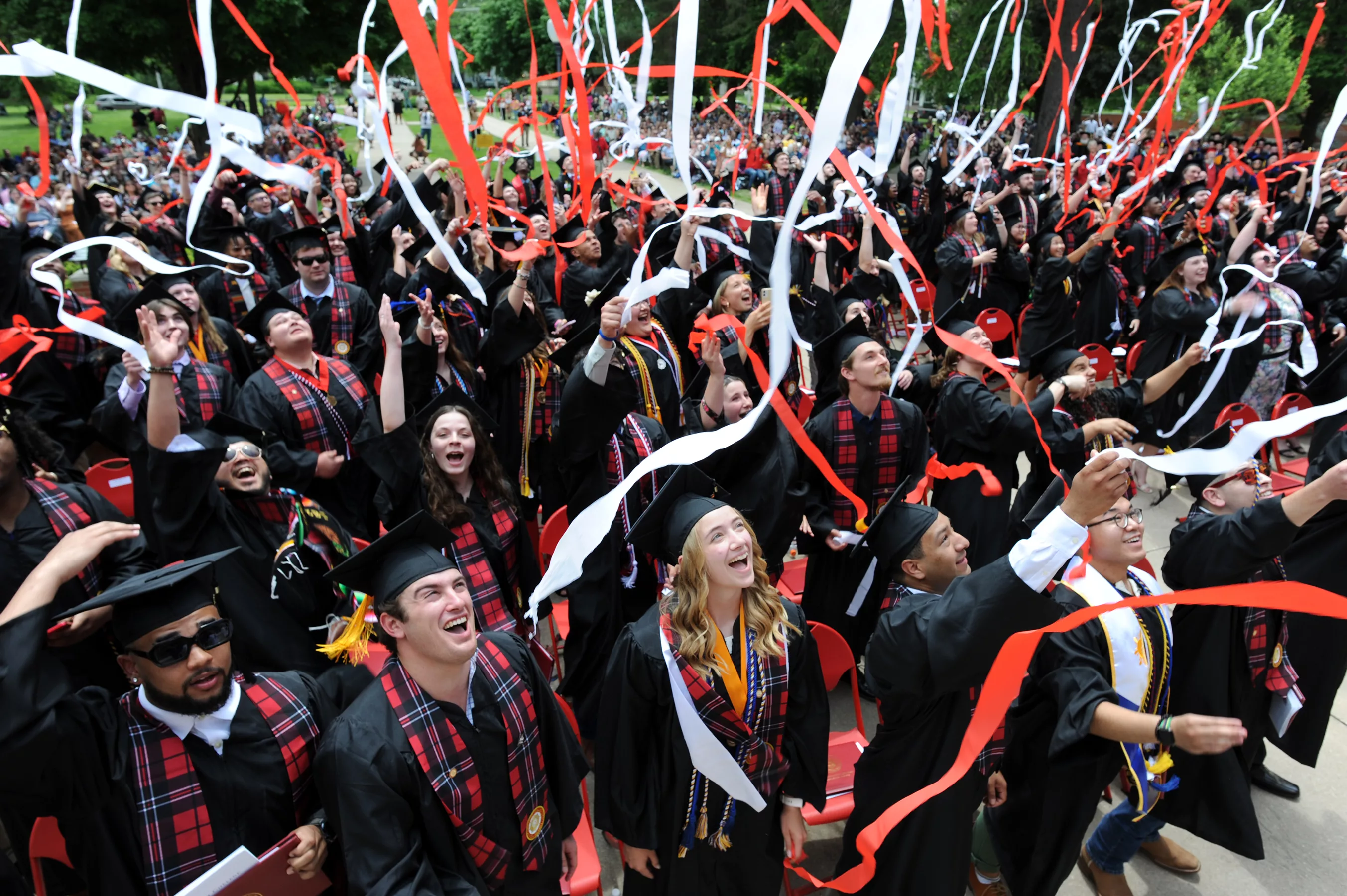 Members of the Monmouth College Class of 2024 celebrate their graduation on Sunday, May 19, on the College's Wallace Hall Plaza. The commencement address was given by actress Sigourney Weaver and her writer/director husband, Jim Simpson.