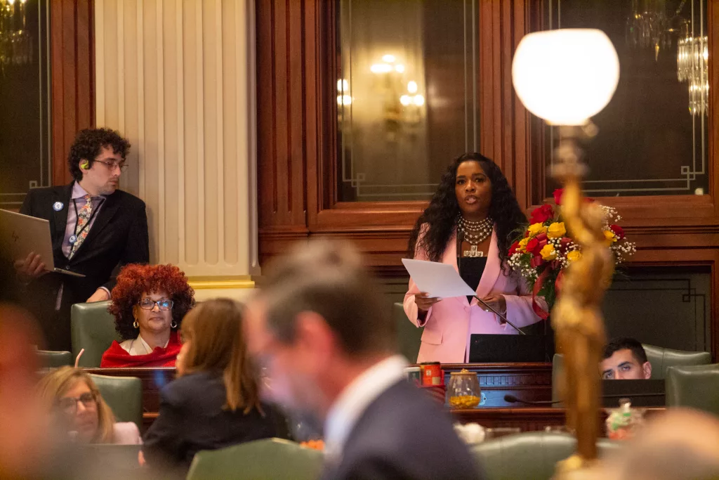 State Rep. Jehan Gordon-Booth, D-Peoria, introduces the state’s operating budget in the early hours of Wednesday morning at the Capitol. The budget passed after 1 a.m., with Gordon-Booth calling it “balanced, responsible and fair.” (Capitol News Illinois photo by Jerry Nowicki)