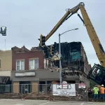 Fire-demo-060124-4: A crew from USA Recycling started the demolition process at 149-151 E. Main Street at 8:45 a.m. Saturday, June 1, 2024. (JAY REDFERN/WGIL)