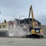 Fire-demo-060124-3: A crew from River City Demolition of Peoria started the demolition process at 149-151 E. Main Street at 8:45 a.m. Saturday, June 1, 2024. (JAY REDFERN/WGIL)