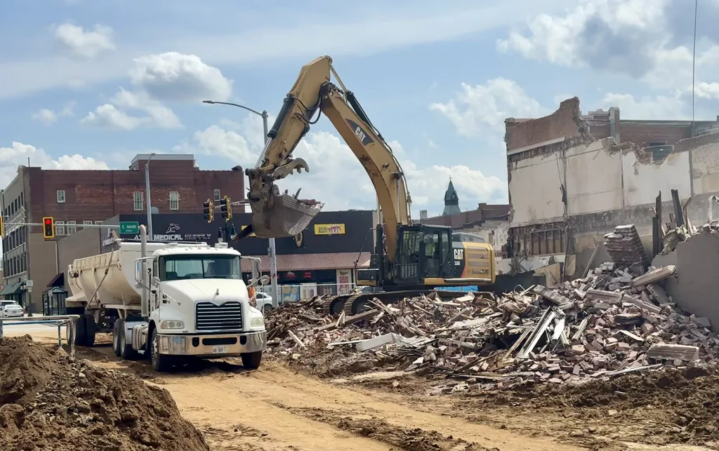 USA Recycling continues cleanup and hauling materials from the site on Main and Prairie streets today to an EPA approved temporary sorting location at 1480 S. Henderson St.