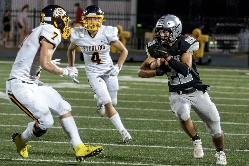 Galesburg's Cameron Aguirre runs the ball during the Silver Streaks' 48-21 Western Big 6 Conference loss to Sterling on Sept. 9, 2022 at Van Dyke Field.