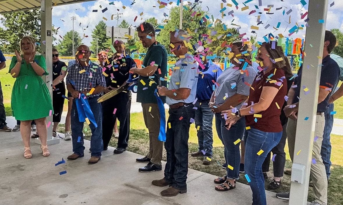A ribbon cutting celebrating renovations to H.T. Custer Park was conducted Friday, June 21, 2024. The project includes a new playground, picnic shelter, restrooms, walking path, bicycle training area, rain/butterfly garden and a parking lot.