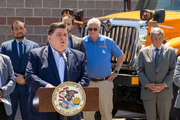 Gov. JB Pritzker speaks to reporters at a news conference on June 14. Pritzker said a recent U.S. Supreme Court ruling doesn’t affect Illinois’ ban on bump stocks and other firearm accessories. (Capitol News Illinois photo by Andrew Adams)