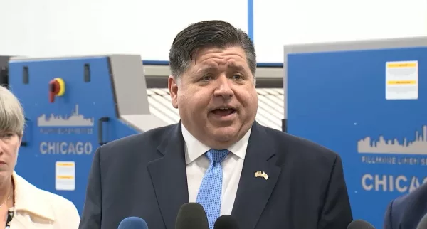 Gov. JB Pritzker tells reporters he is “all in” for President Joe Biden at an unrelated news conference in Chicago on Tuesday. (Credit: Illinois.gov)