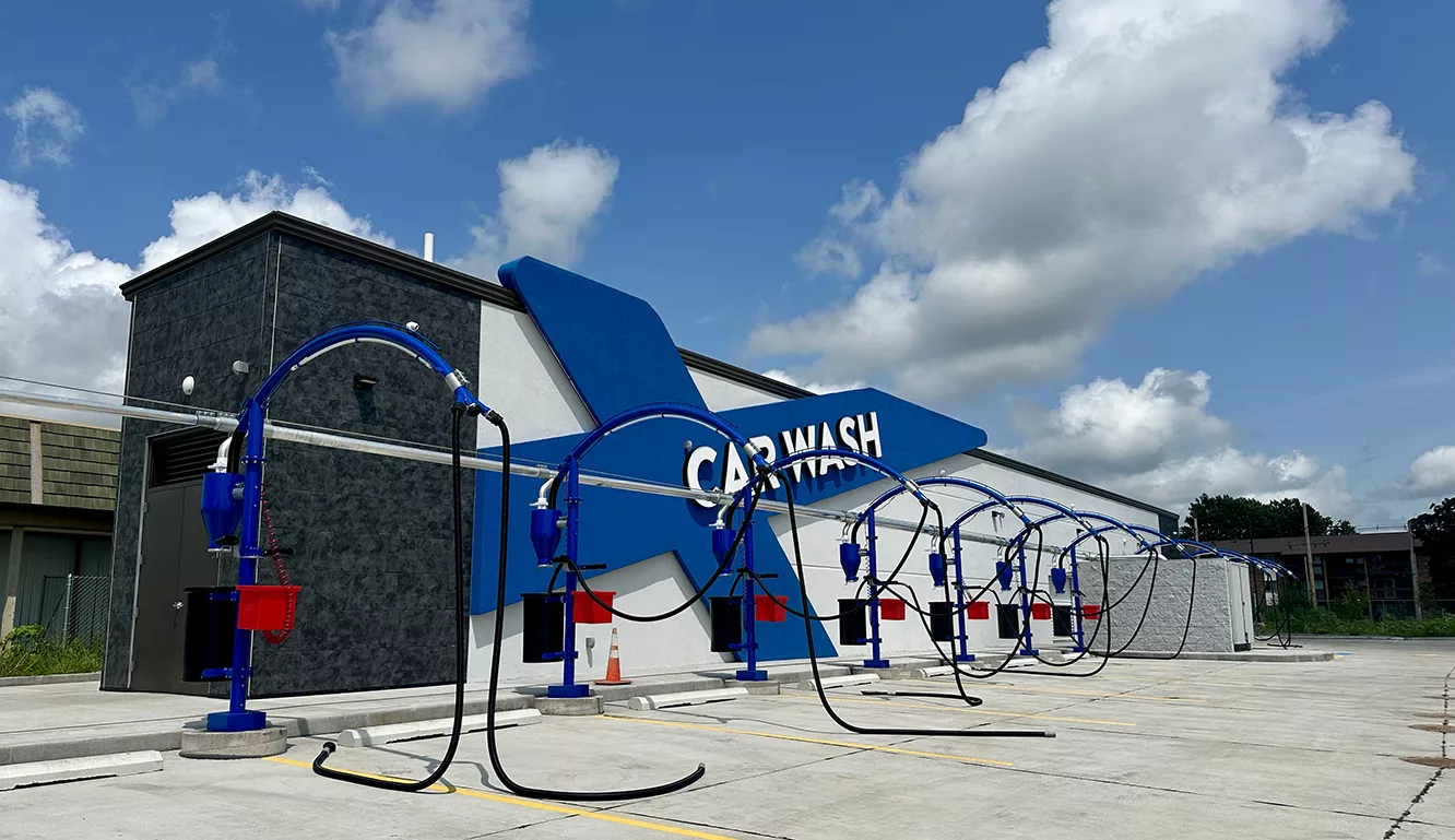 A new Champion Xpress car wash at 1819 N. Henderson St. is now scheduled to open in “mid September.”