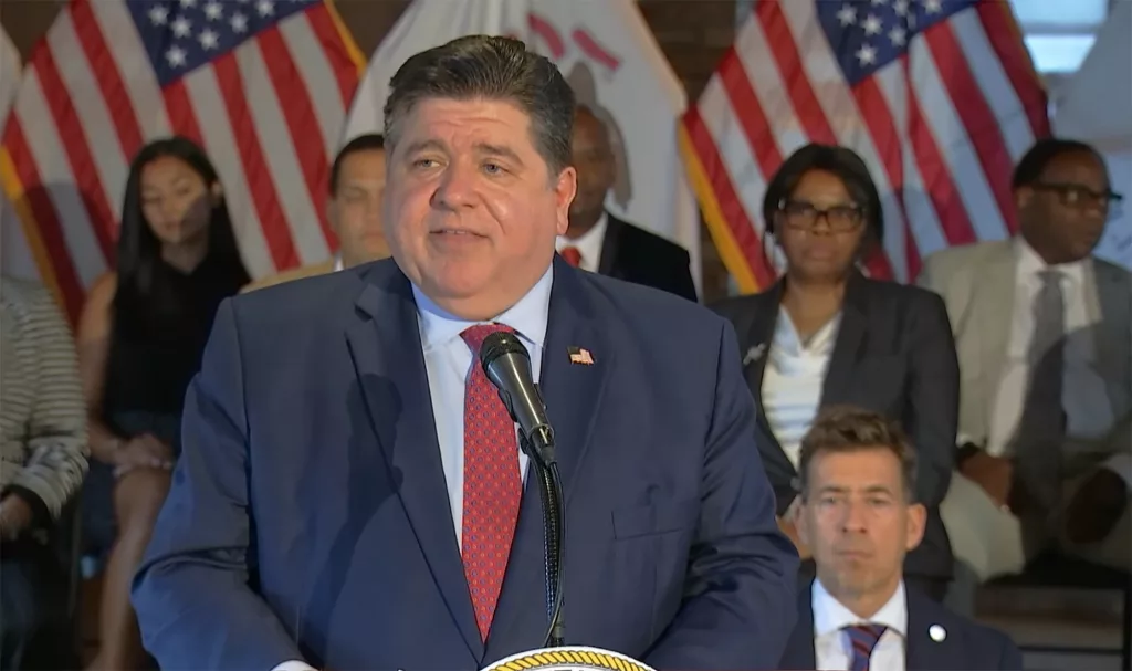 Gov. JB Pritzker speaks at a news conference in Chicago prior to signing a bill aimed at giving more Illinoisans who leave a correctional facility access to a free state ID. (Credit: Illinois.gov)