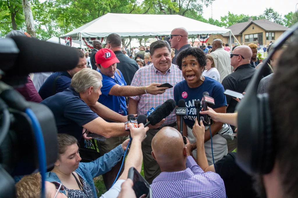 Gov. JB Pritzker and Lt. Gov. Juliana Stratton take questions from reporters Wednesday during Governor’s Day at the Illinois State Fair. (Capitol News Illinois photo by Jerry Nowicki)