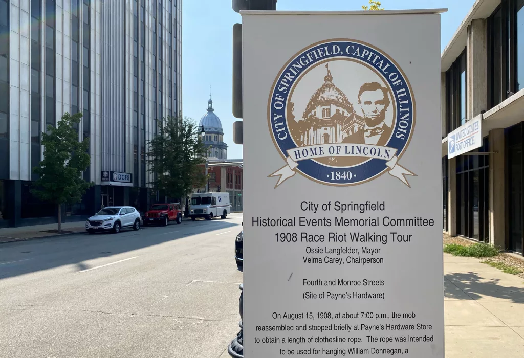 A sign for a Springfield walking tour commemorates the city’s 1908 race riot, just blocks away from the Capitol. On Friday, President Joe Biden designated part of the riot location a national monument. (Capitol News Illinois photo by Jerry Nowicki)