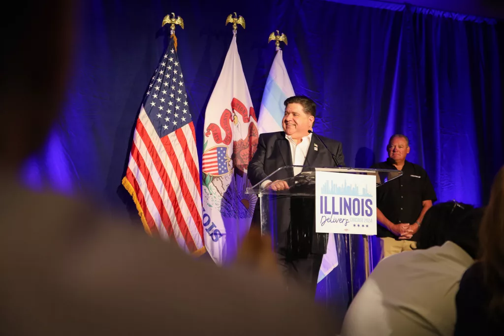 Gov. JB Pritzker opens the Illinois delegation's Monday breakfast at the Democratic National Convention. (Capitol News llinois photo by Andrew Adams)