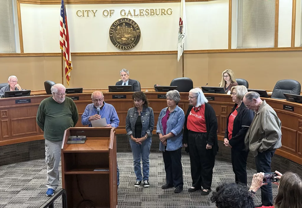 Galesburg Ward 3 Alderman Evan Miller reads a proclamation for Respect Life Month at the City Council meeting on Monday, Oct. 22, 2024.