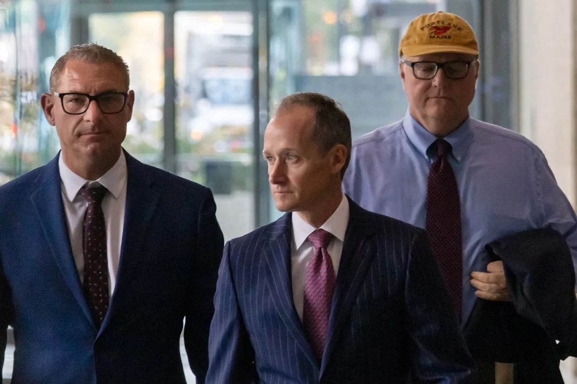 Will Cousineau, a longtime staffer for former Illinois HouseSpeaker Michael Madigan and current Statehouse lobbyist, walks out of the Dirksen
Federal Courthouse at the end of his second day of testimony in the corruption trial of
his former boss on Wednesday, Oct. 30. Cousineau will return for more cross-
examination on Monday. 