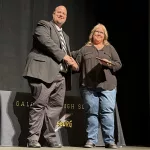 Stacie Westfall for Mike Westfall: Longtime District 2305 custodian Mike Westfall entered the Galesburg Athletic Hall of Fame as a Friend of GHS Athletics on Saturday, Nov. 30, 2024, at Galesburg High School. He was unable to attend the ceremony. Accepting the award for Westfall was his wife Stacie. (WGIL)