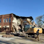 cherry-street-demo: Work got underway Thursday afternoon to demolish a building at 179 N. Cherry St. damaged by a fire on Dec. 5, 2024. (JAY REDFERN/WGIL)