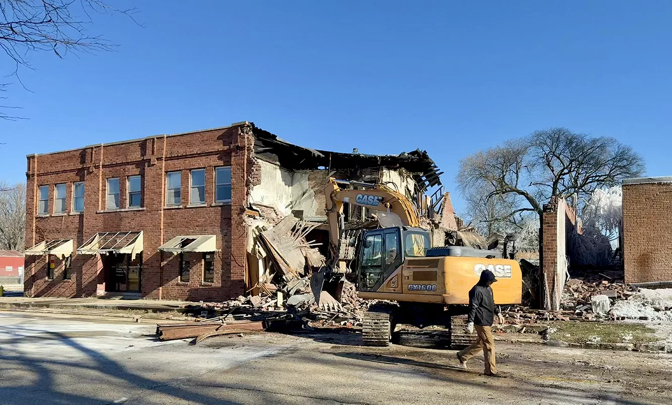 Work got underway Thursday afternoon to demolish a building at 179 N. Cherry St. damaged by a fire on Dec. 5, 2024.