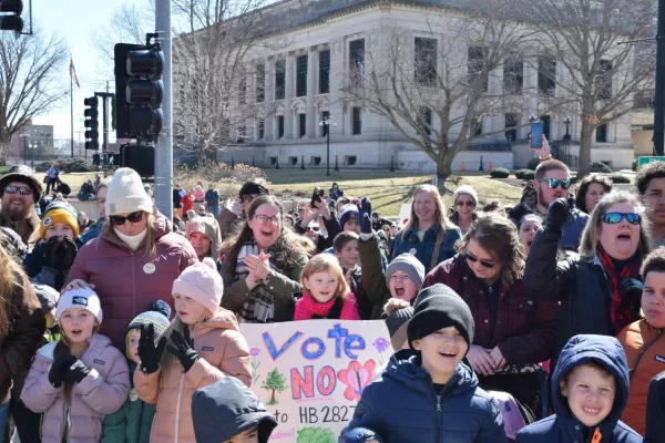 Homeschool advocates rally at the Illinois Statehouse to oppose legislation that would impose more oversight of parents who school their children at home.